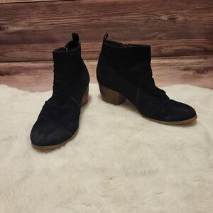 Restricted black suade zip up ankle booties